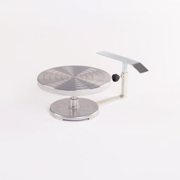 La tournette de table Hauteur 12 cms diamètre 23 cms avec repose bras est de qualité professionnelle et a une excellente rotation. Elle est adaptée aux peintres sur porcelaine. Elle a un repose bras réglable en hauteur.